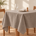 Taupe linen and cotton tablecloth on a dining table